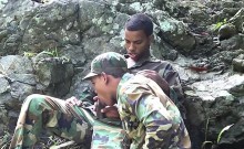 Army boys scout for hard meat outdoors