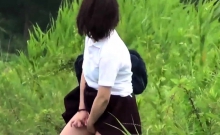 Urinating teen asians