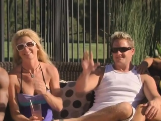 Softcore sex with a kinky swinger couple
