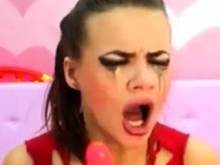 Cam girl face fucks and gags her self hard