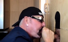 Bottom DILF gives head in gloryhole