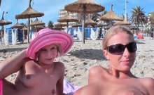 Two Blonde Sluts Seduced Into A Threesome On The Beach