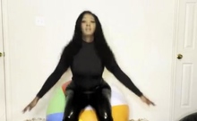 Ass bouncing on large beach ball before finger nail pop