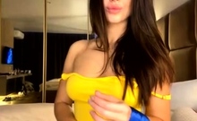 Busty curly brunette with big boobs fucks on couch
