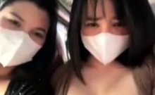 two sisters being sensual on the bus for the camera 84412587