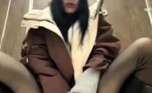 Asian teen masturbating her pussy in shopping mall bathroom9