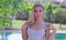 Teen takes off her white polkadot bikini