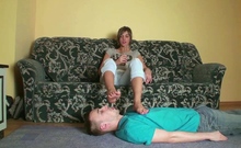 Lady Sylwia humiliating slave on sofa